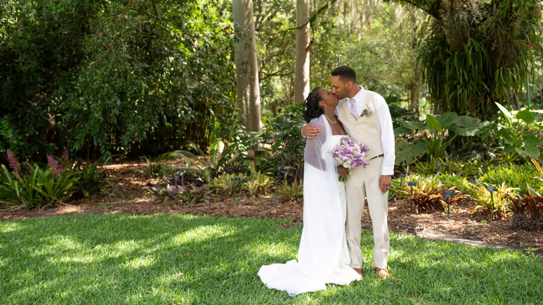 Florida marriage license by mail order. Photo showing wedding couple kissing in beautiful park
